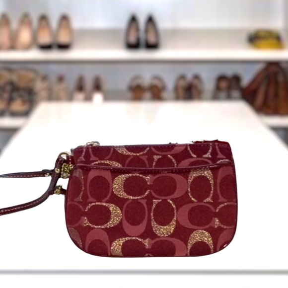 Coach wristlet with variety of red shades, silver and purple 4"x6" - Picture 1 of 4
